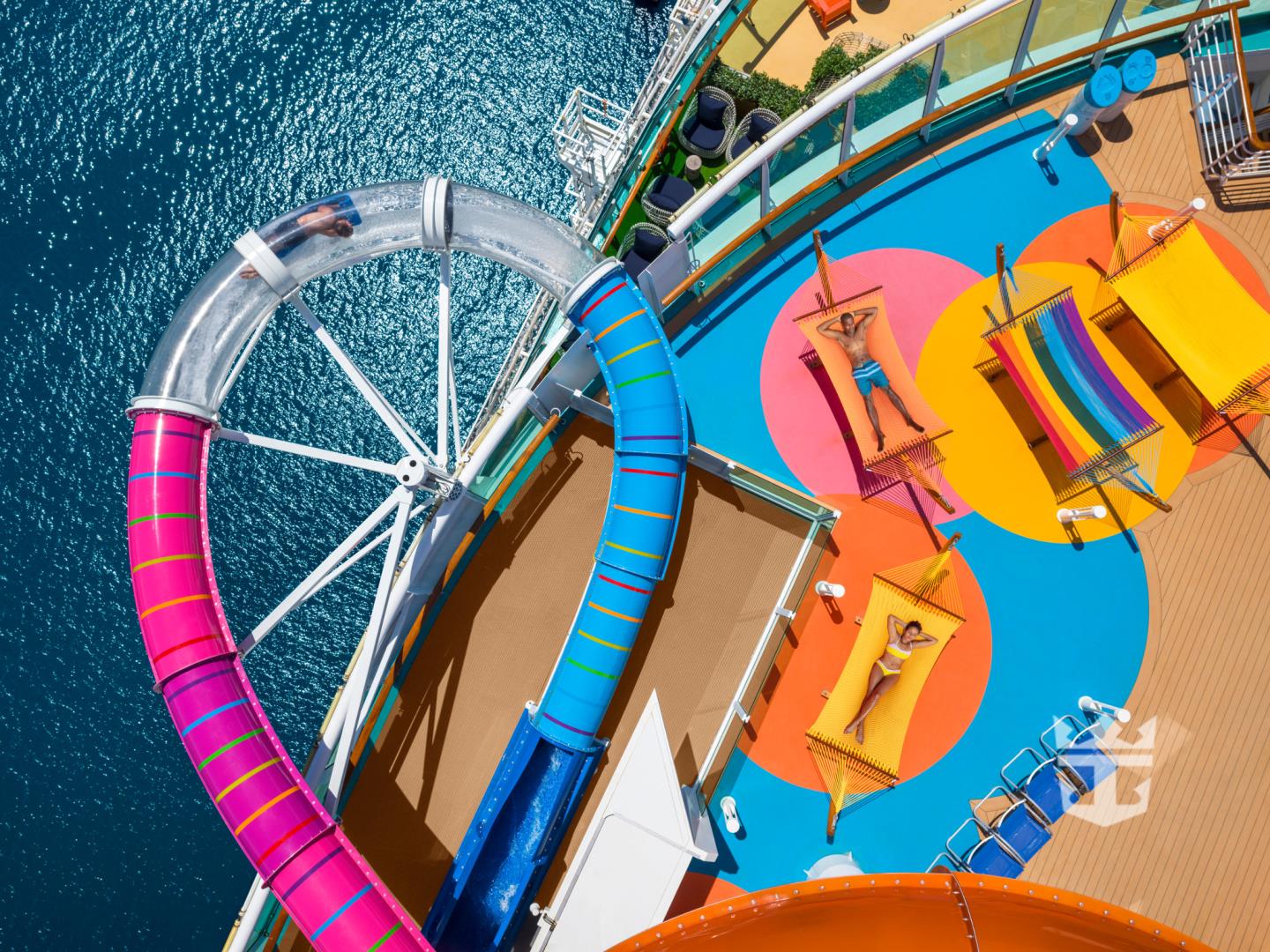 Dramatic shot of Navigator of the Seas with POV from above tubes of Riptide water slide